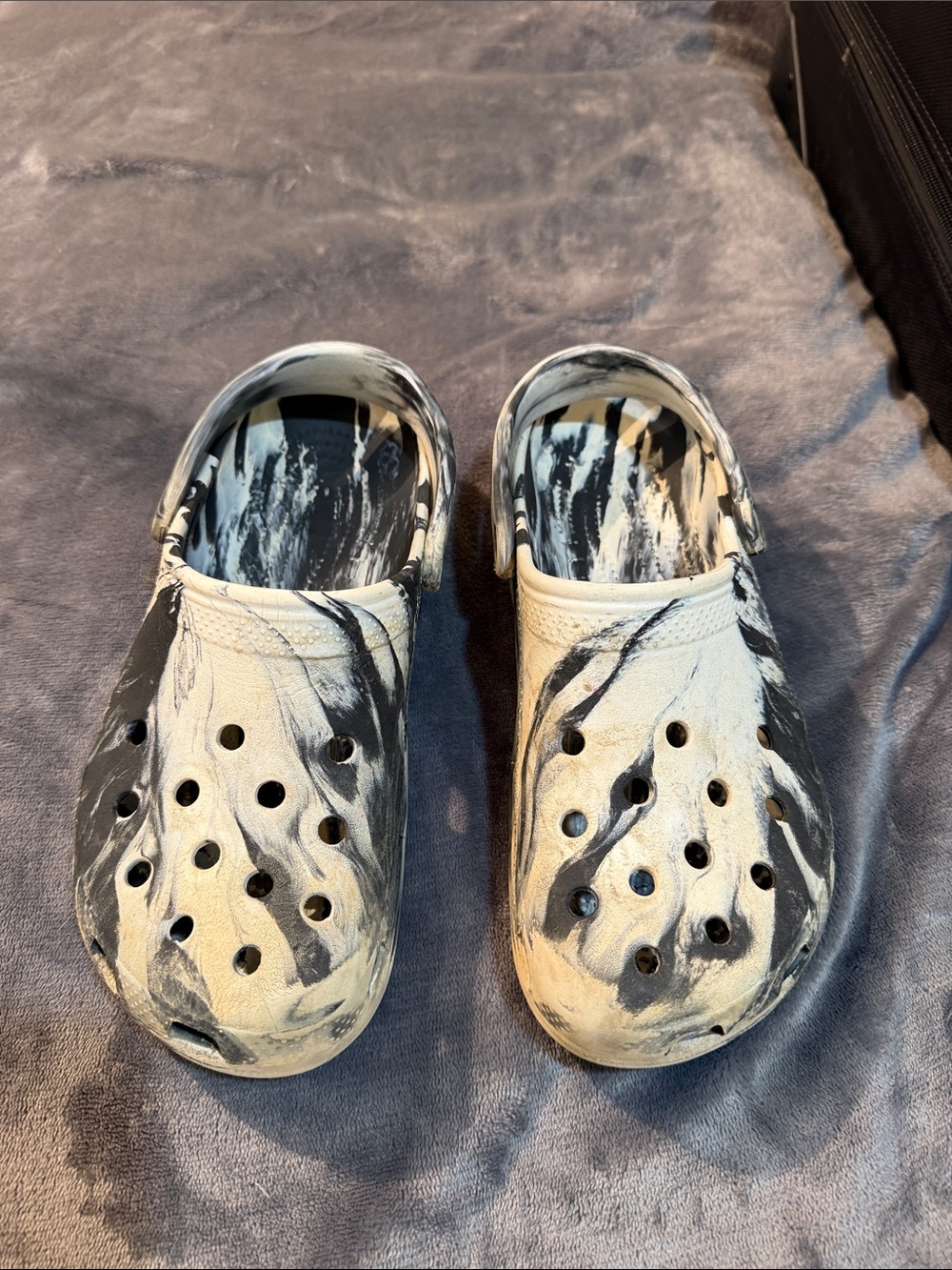 CROCS Marble-Pattern Slip-On Clogs in Black and White